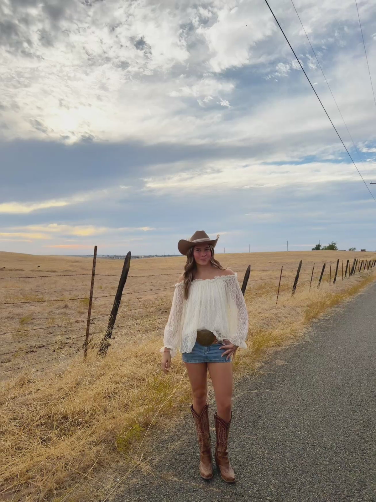 off the should long sleeve top, see through lace arms and white mid section, country western inspired. 